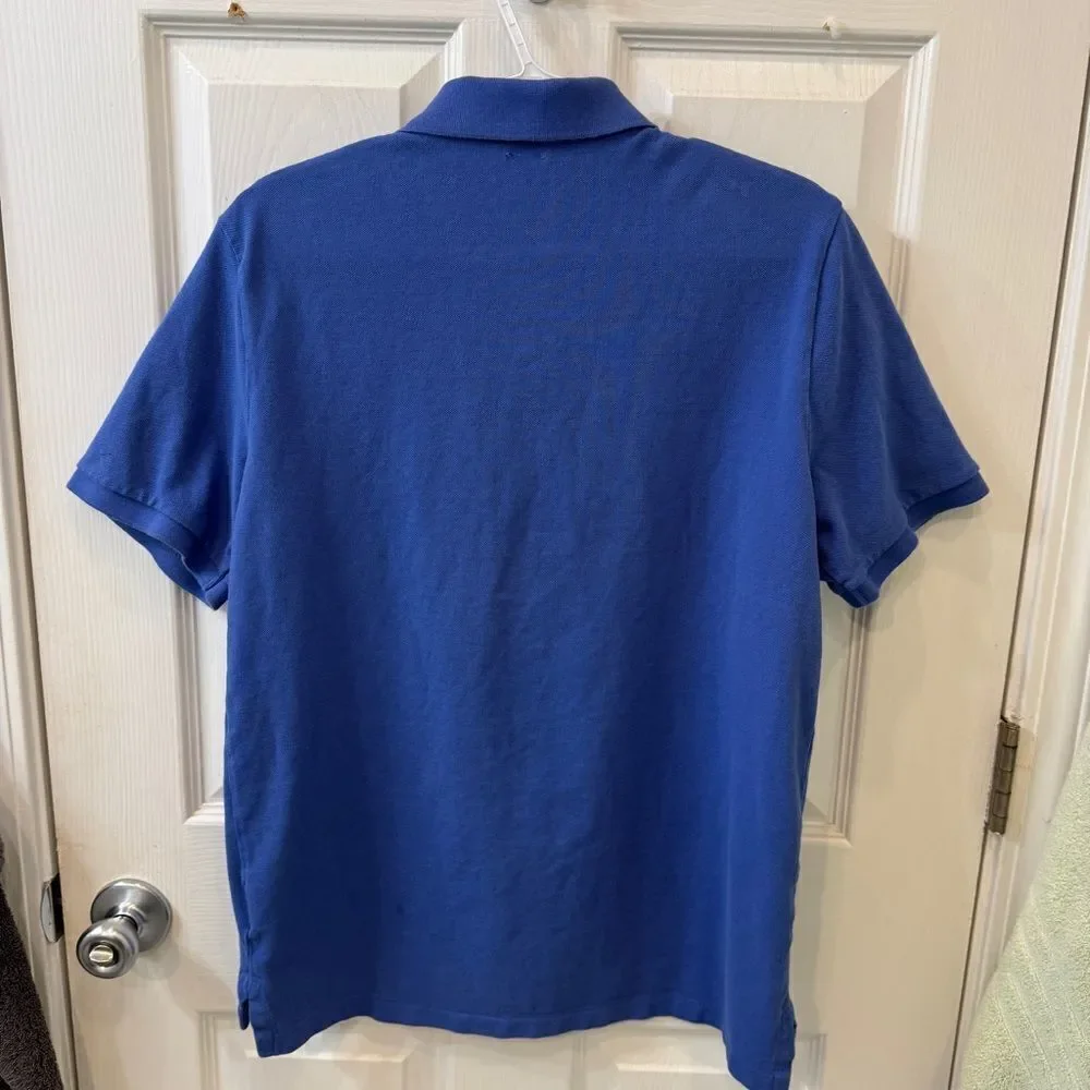 Polo Ralph Lauren Blue Polo Shirt in great condition. Size Medium- 100% cotton